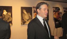 Matt Brown in front of Weegee photos at the Bow Tie Chelsea Cinemas